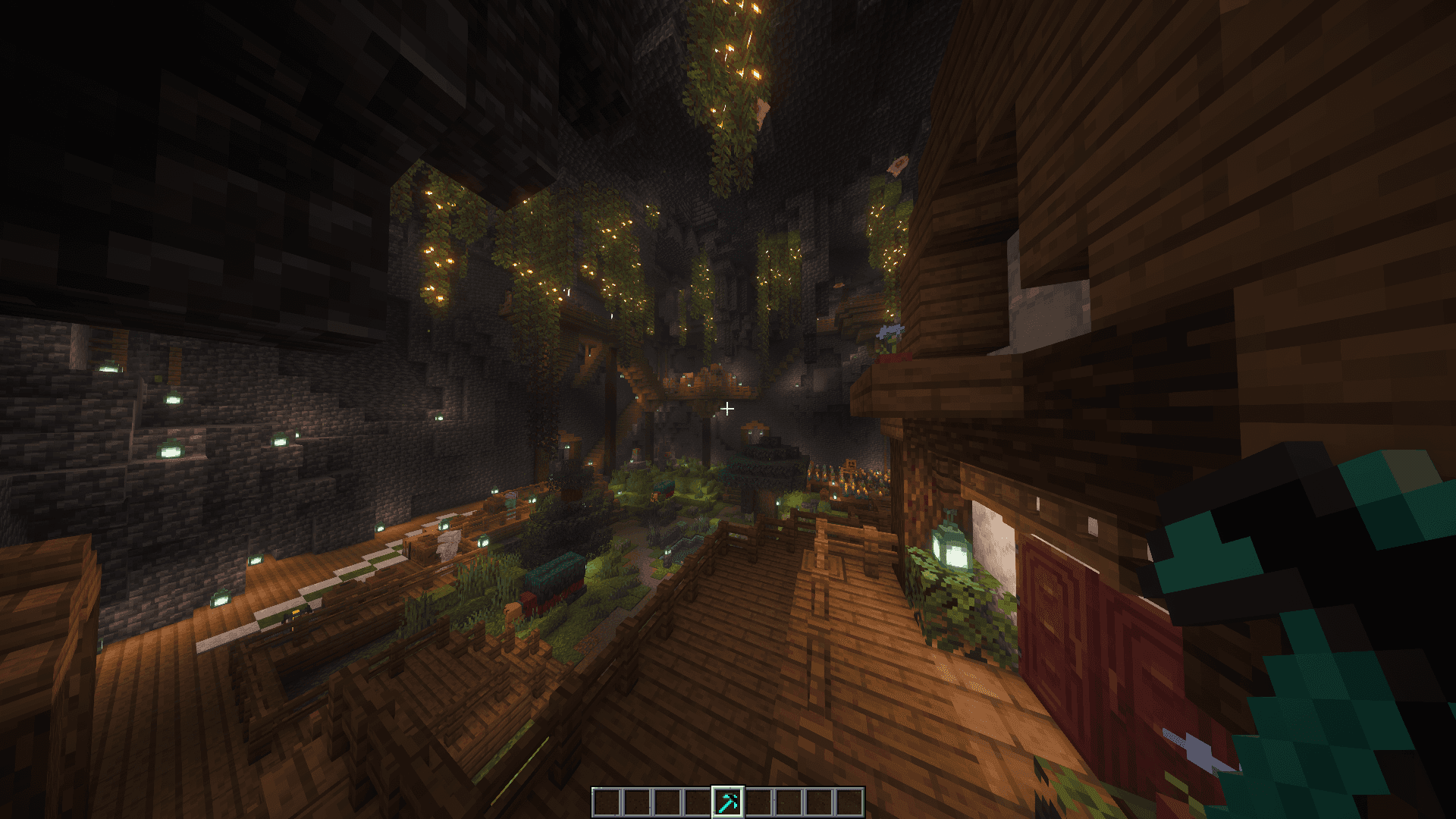 An in-game view inside the Sanctuary structure with warm lights, stone walls, and a breacher tool